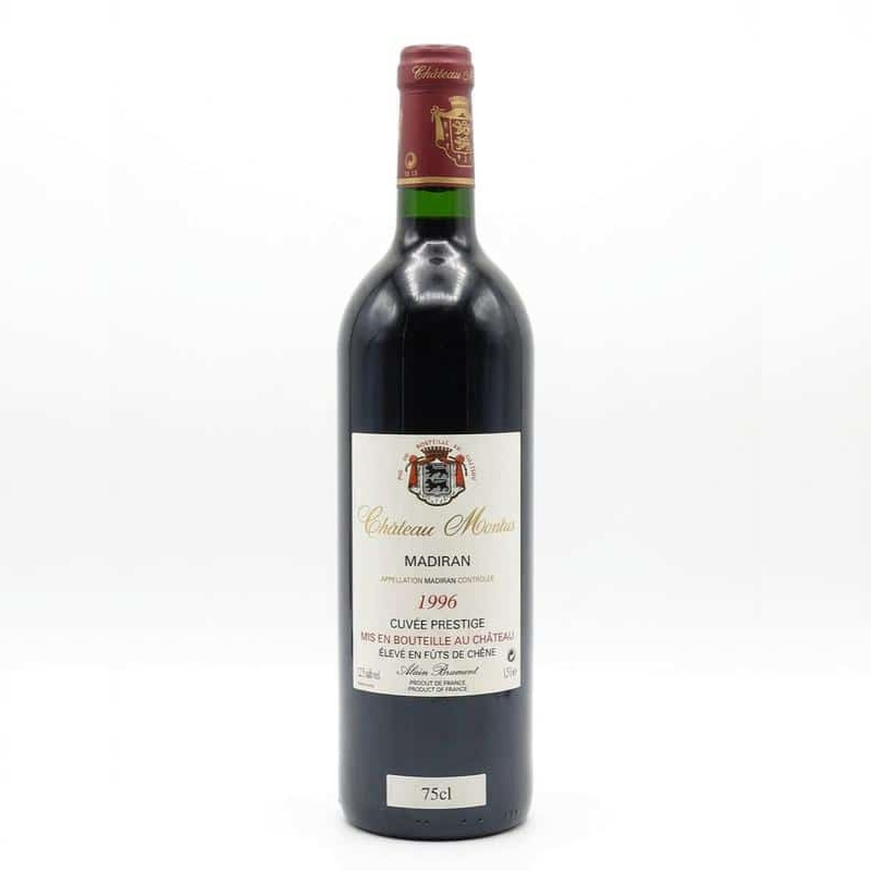 Eine Flasche Château Montus Madiran Cuvée Préstige 1996 mit sichtbarer 75cl-Angabe und Wappenetikett.